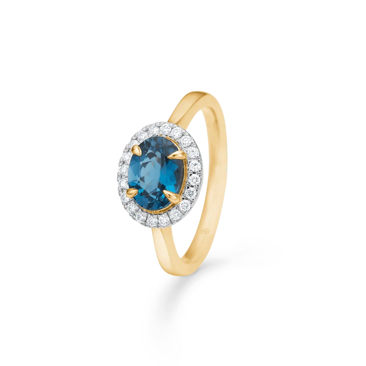 Forlovelsesring i 14 kt guld med blå topas og brillanter